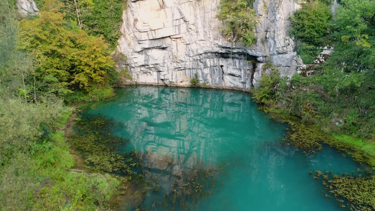 Turquoise Water And Rock Formation Of Lahinja River Natural Spring. Metlika, Slovenia