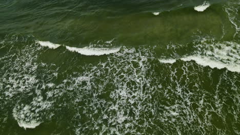 Beautiful-green-waves-of-Wladyslawowo-in-Poland--wide