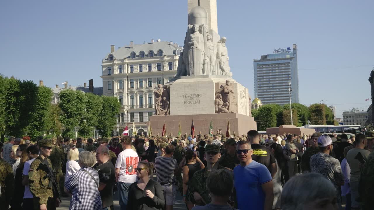 Young military conscripts being sent off by family at ceremony in Riga, Latvia