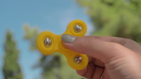 playing and relaxing with fidget spinner