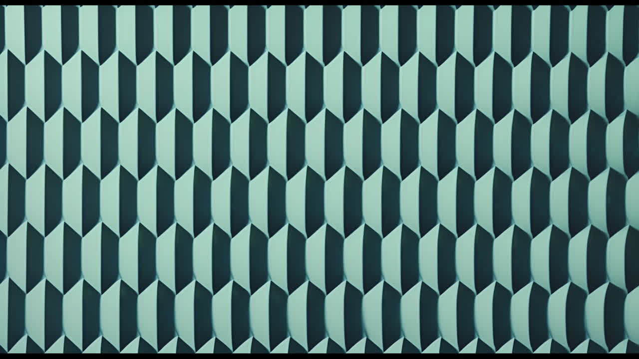 Animation of green and black shapes moving in repetition