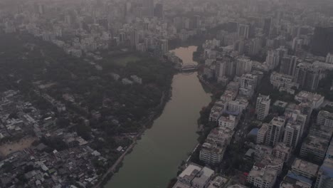 beautiful evening city with lake at sunset