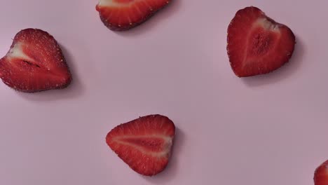 strawberry background motion design video. bio slice fruit berries. color texture close up. 4k 3840x2160