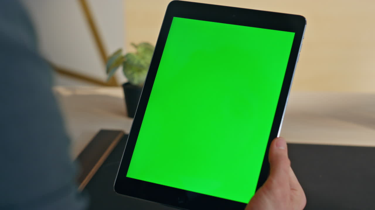 Guy finger touching chromakey tablet display starting lesson at home zoom on