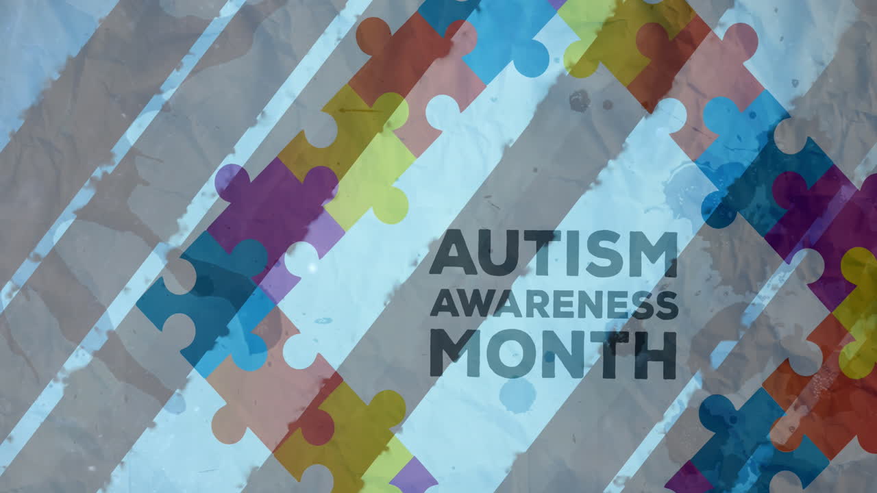 Animazione di testo sul mese della consapevolezza sull'autismo su pezzi di puzzle colorati e strisce