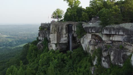 waterfall on cliffside, tourist point of interest in rock city gardens on lookout mt, georgia