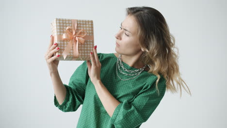 woman holding a gift box