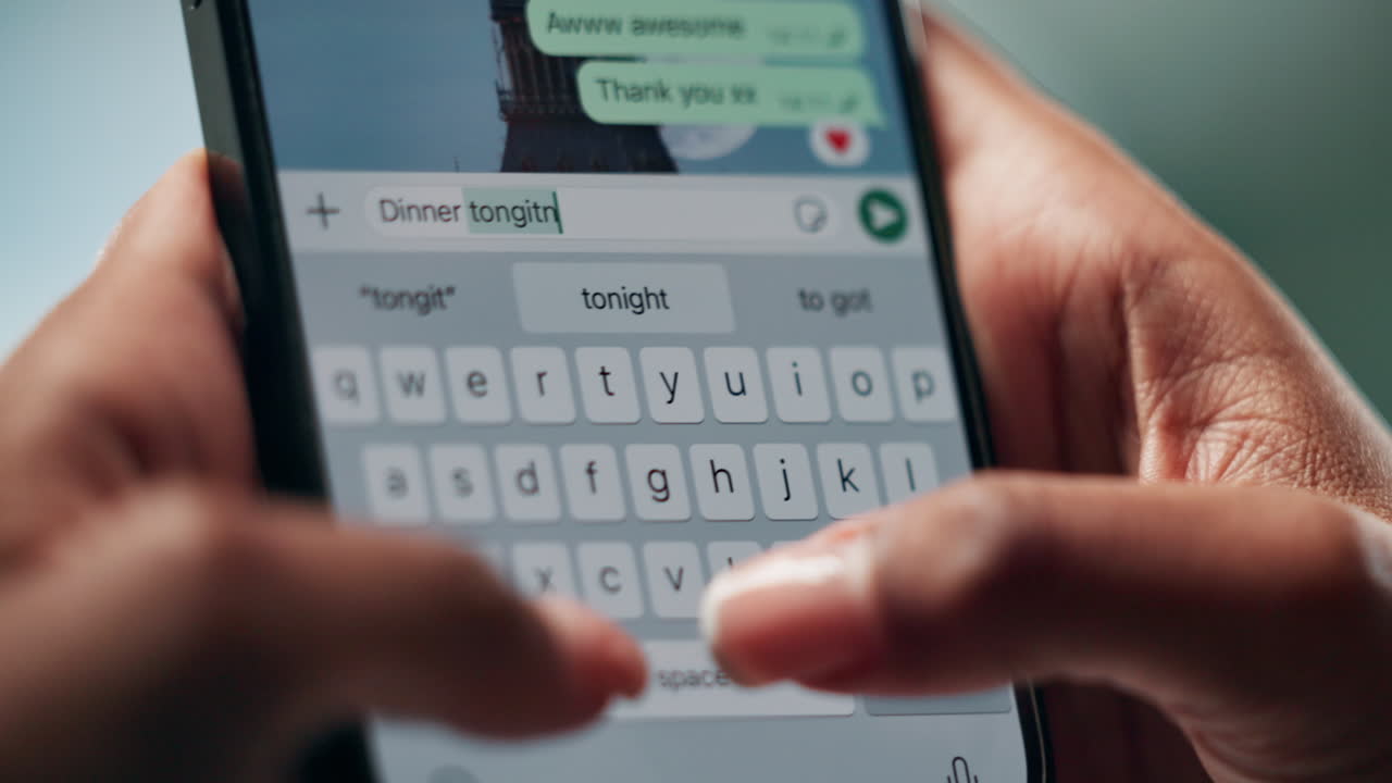 Typing a Text Message on a Smartphone