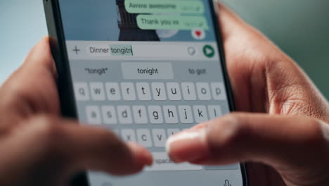 typing a text message on a smartphone