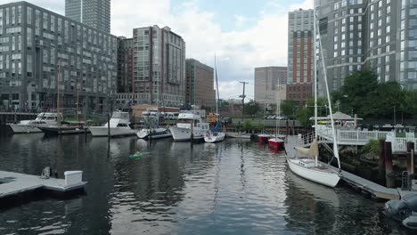 beautiful woman kayaking through the marina in jersey city