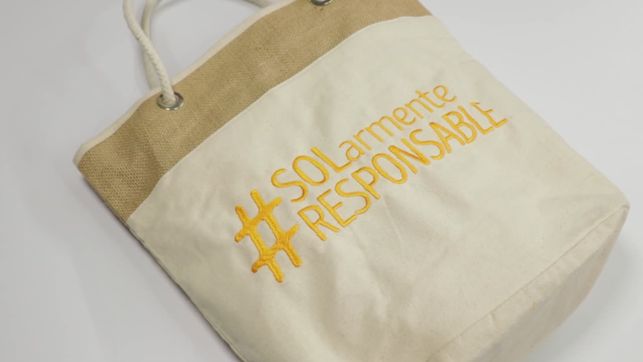 Beige tote bag from handmade materials, sun protection hashtag