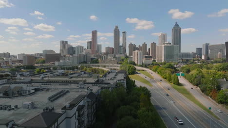 aerial panoramic view of downtown skyscrapers on sunny day