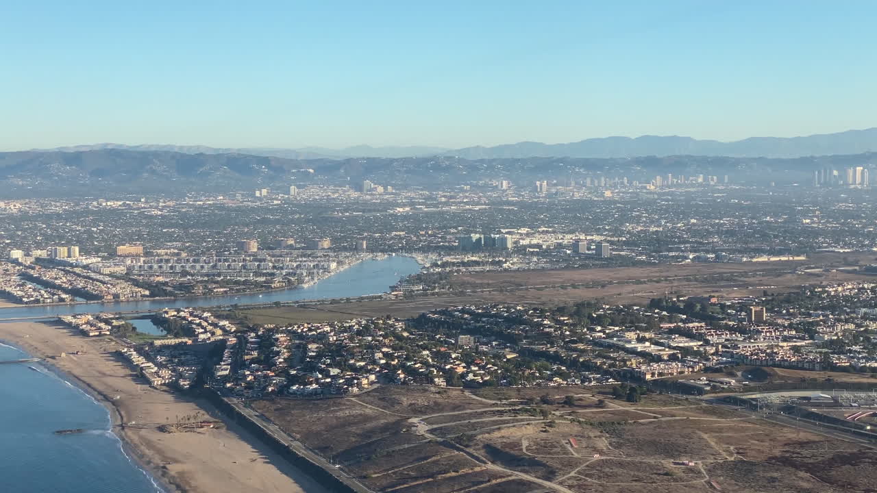 An aerial view of Marina del Rey and Santa Monica in the distance during departure from Los Angeles International Airport
