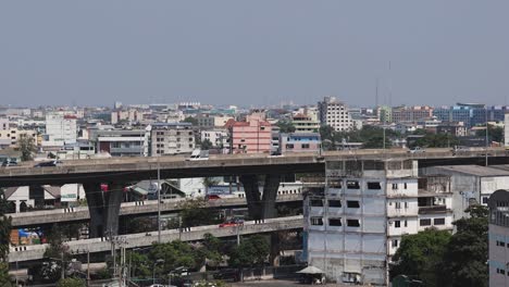 static view of a cityscape with a large overpass