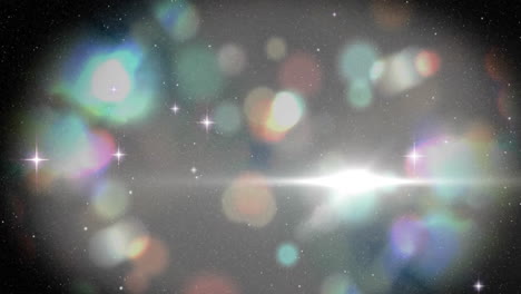 animación de puntos de luz y estrellas sobre fondo negro