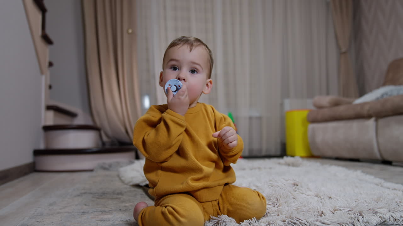 Baby Playing with Pacifier