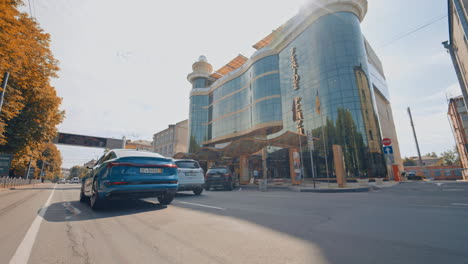 urban city vehicle riding on them road. new stylish car on modern city street.