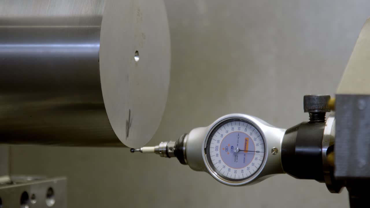 Mitutoyo dial indicator measure a cylindrical workpiece CNC lathe precision engineering