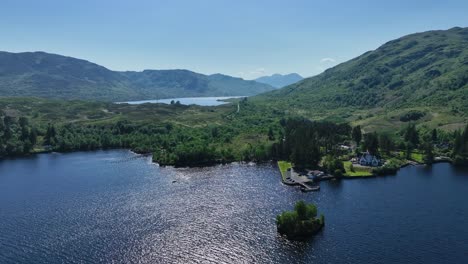 Aerial-Footage-of-Loch-Katrine-in-The-Trossachs-National-Park-in-The-Scottish-Highlands,-Scotland-during-summer