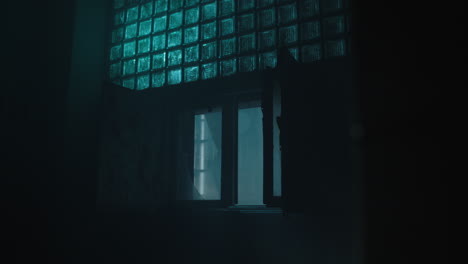 mysterious abandoned building window at night