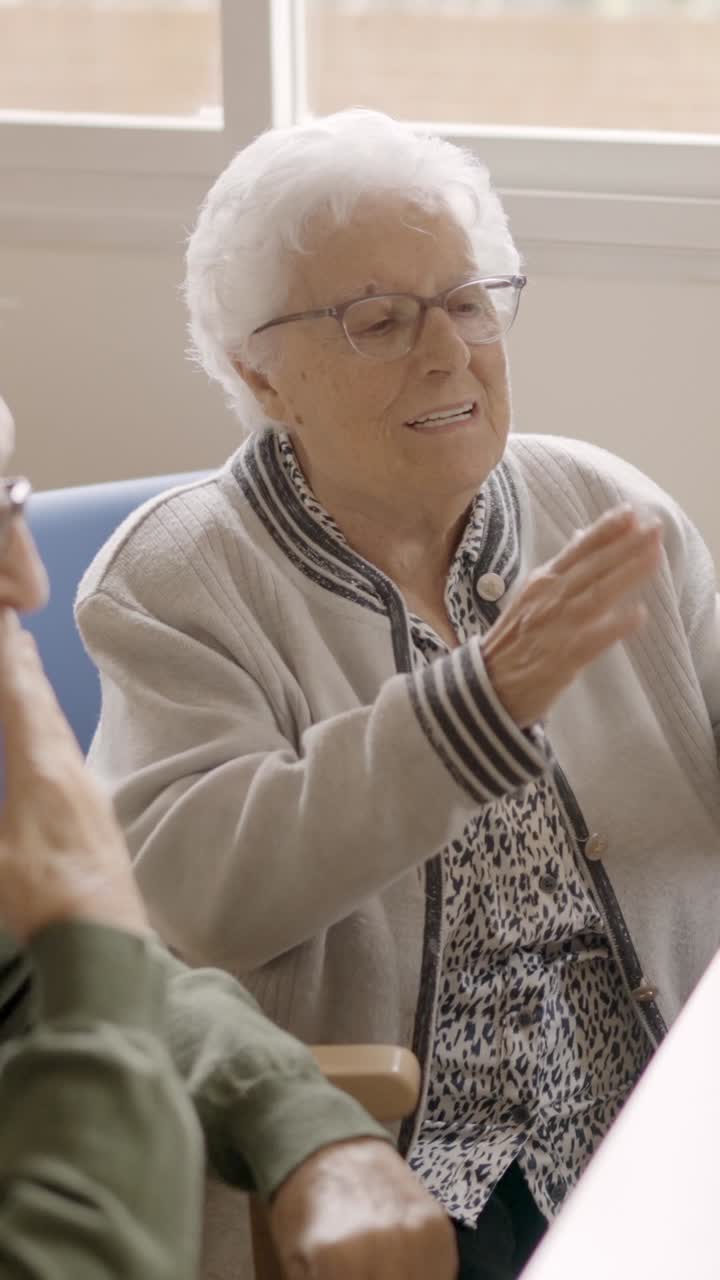 Senior people enjoying a video call using laptop in geriatric