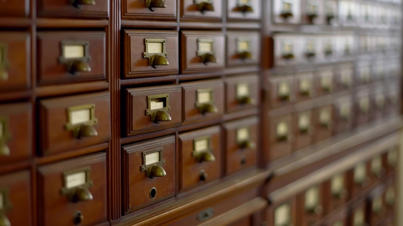 Rows Wooden Card Catalog Drawers Stretching Cinematic Slow Pan Across Antique Wooden Drawers With Brass Label
