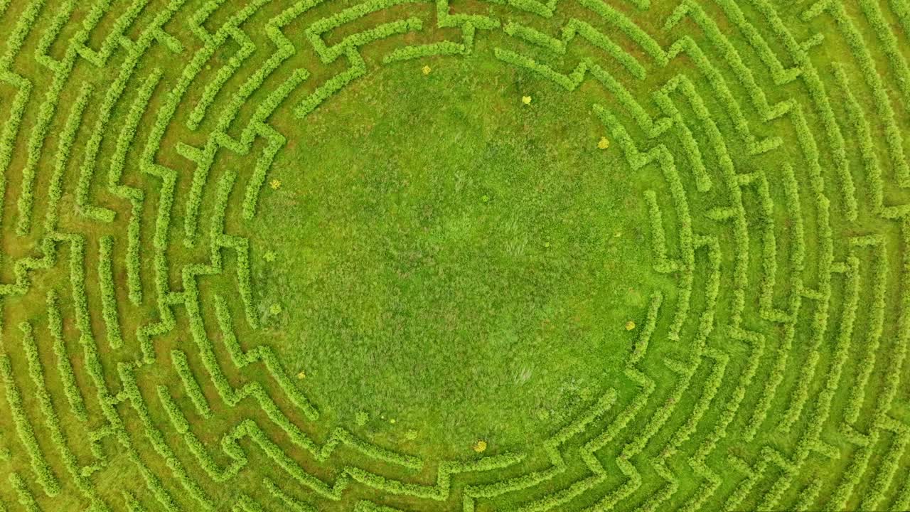 Fast drone movement reveals human-made labyrinth from artistic top view, Latvia