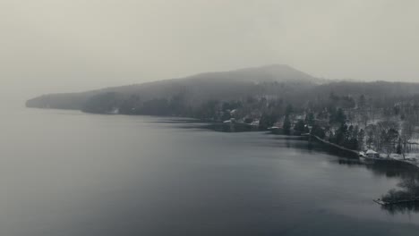 winterly atmosphere on the shores of lake massawippi near manoir hovey hotel in north hatley québec, canada