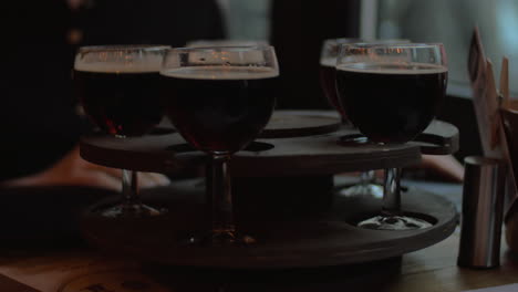 beer glasses served on rotating tray
