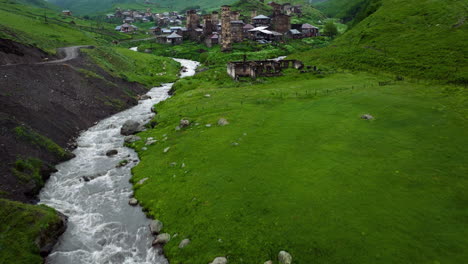 ushguli village with typical tower houses in upper svaneti, georgia - drone shot