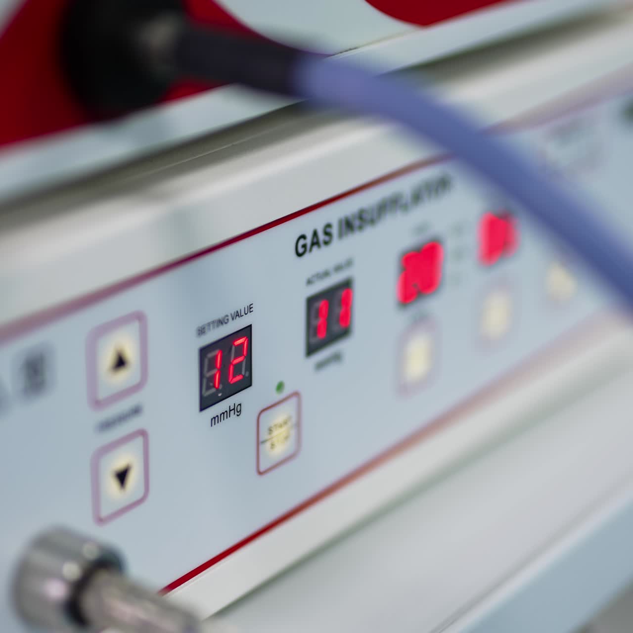 Figures changing on the apparatus in modern surgery room. Advanced equipment in present day hospital. Close up