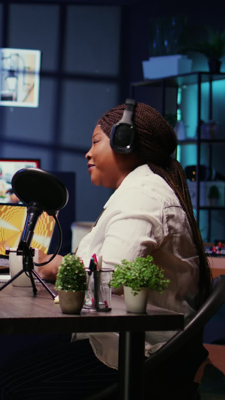 Vertical video Content creator enjoying nice conversation with guest during podcast