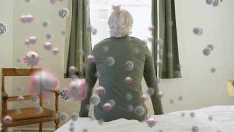 Animation-of-covid-19-cells-floating-over-sick-woman