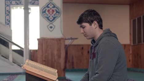 Muslim-Man-Reading-Quran