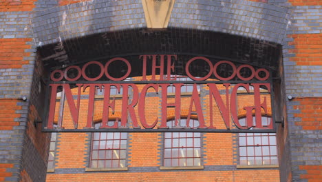 the interchange building steel signage at camden lock market in london, united kingdom