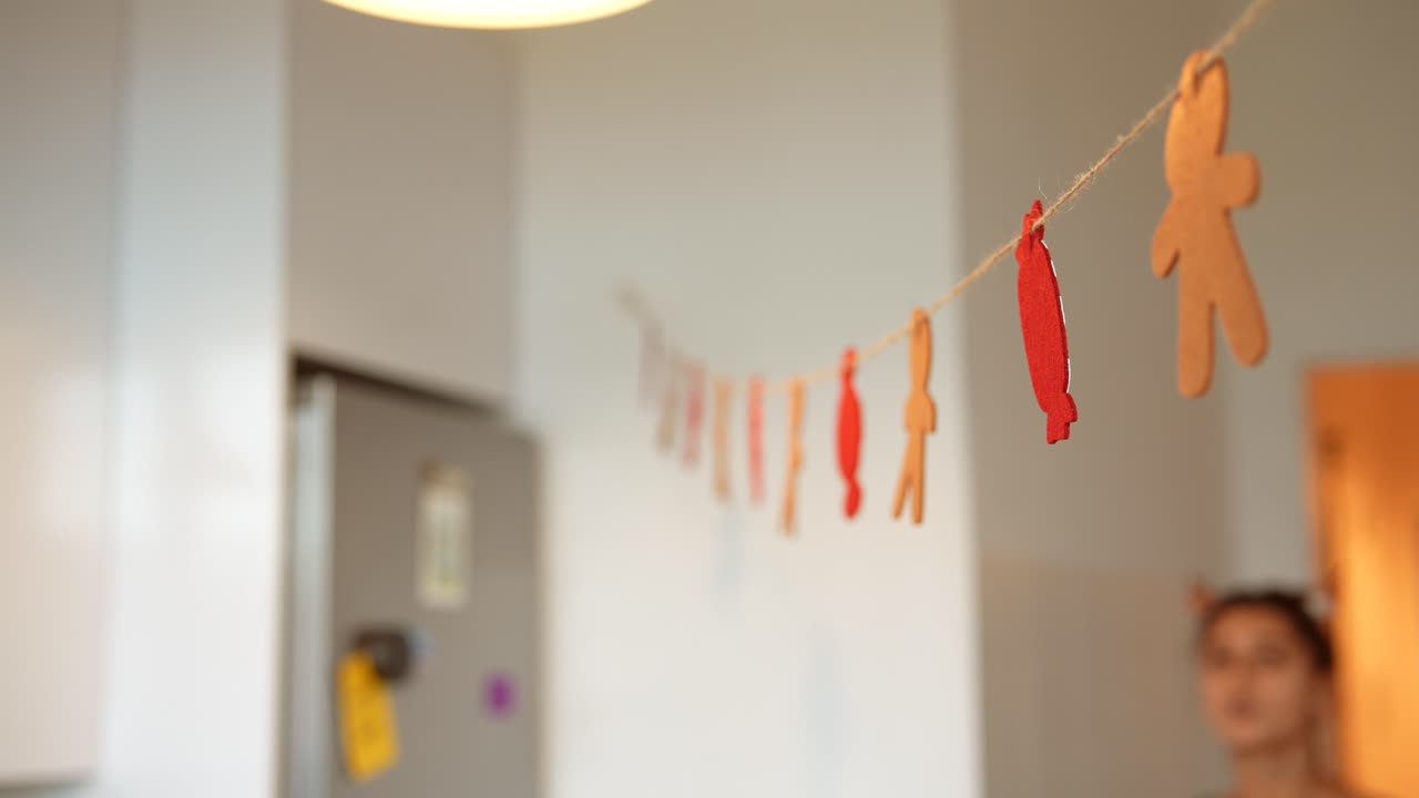 Gingerbread man decorations in kitchen