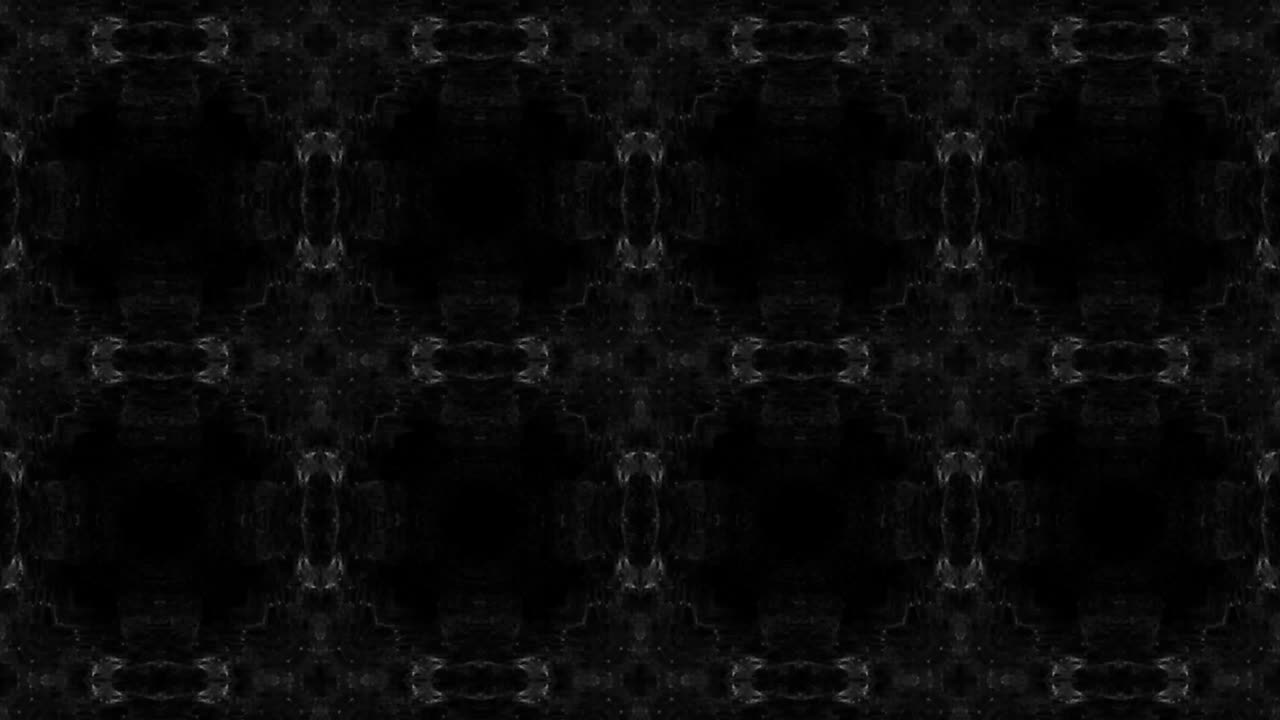 caleidoscopio sobre fondo negro con formas cambiantes animación ahumada