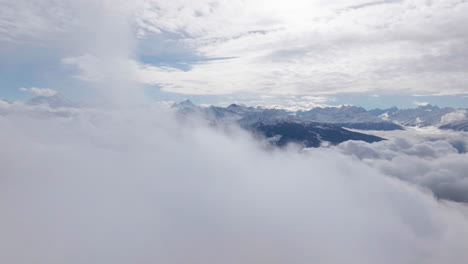 Aerial-shot-in-Switzerland-over-the-town-of-Crans-Montana,-Valais