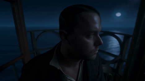 Mysterious Man with a Key at Night Above the Sea