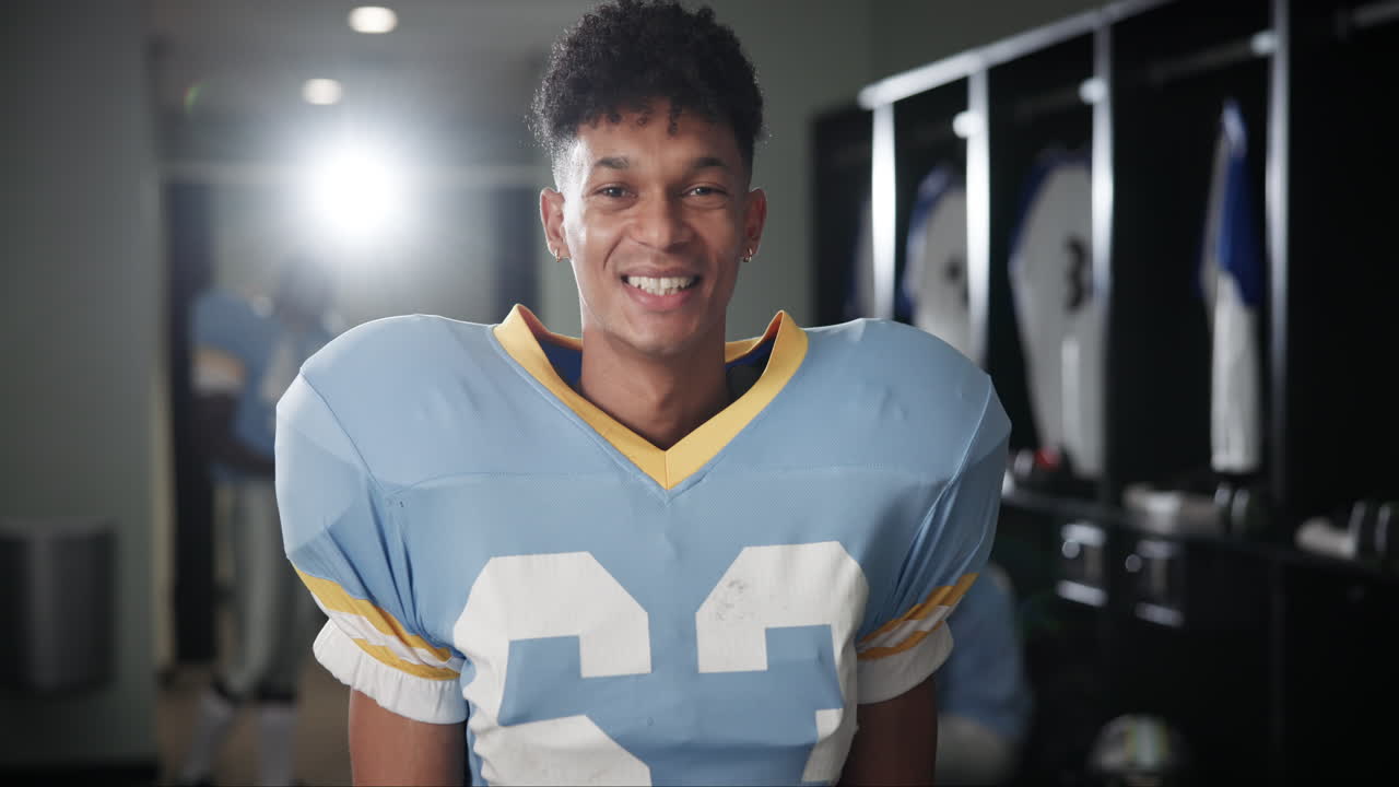 Football player portrait in locker room