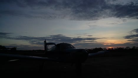 plane at sunset in the angar