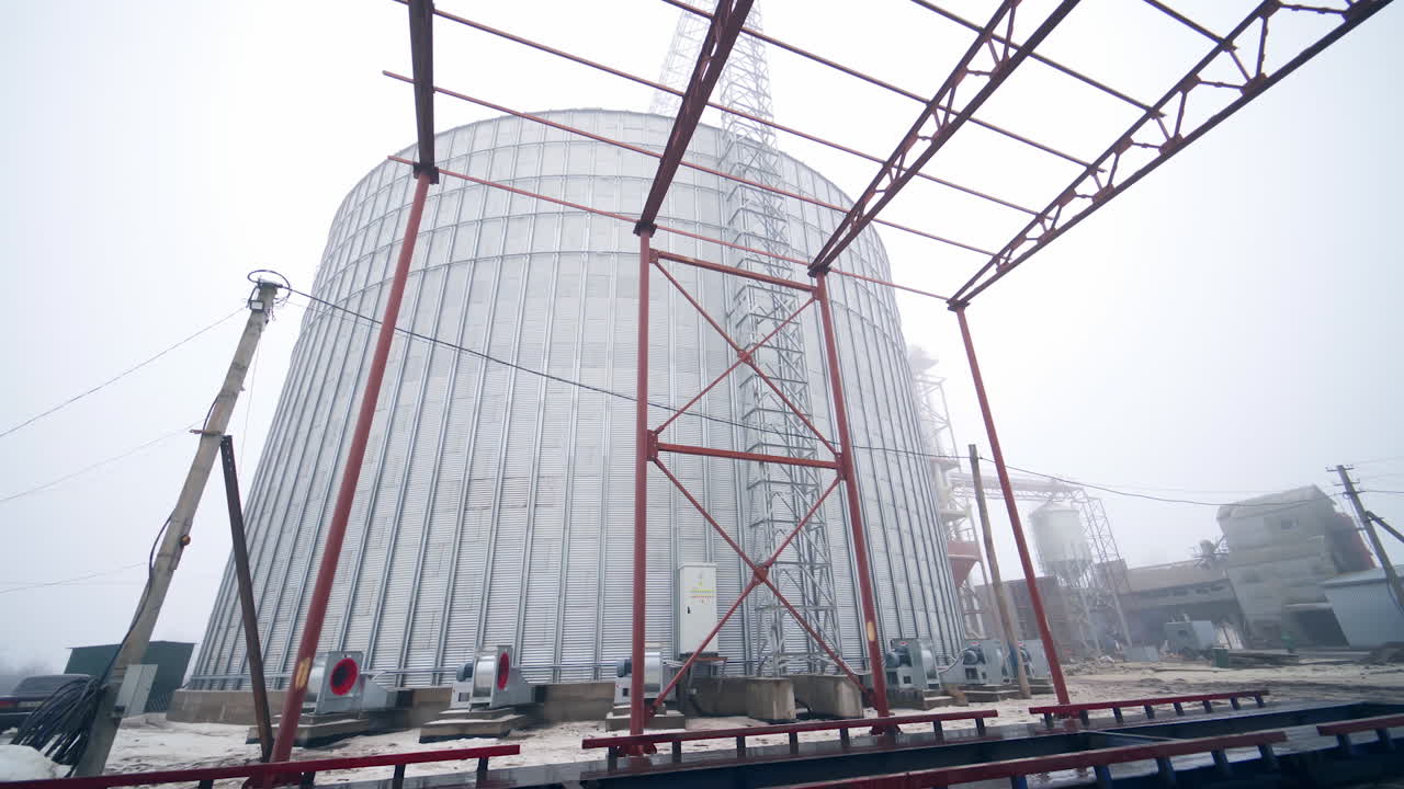 Large metal hangar for grain. Grain storage elevator, Large metal hangar for grain.