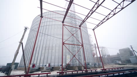 large metal hangar for grain. grain storage elevator, large metal hangar for grain.