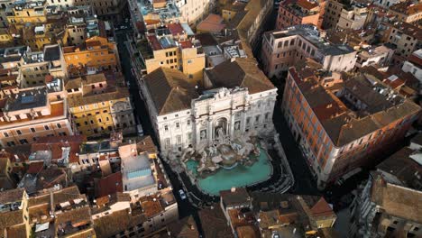 cinematic establishing drone shot above trevi fountain