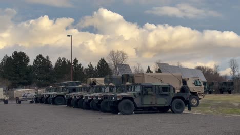 military supply hummers parked and protected