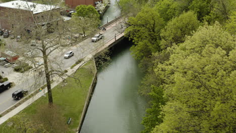 aerial - sager creek in siloam springs, arkansas, wide rising reverse shot