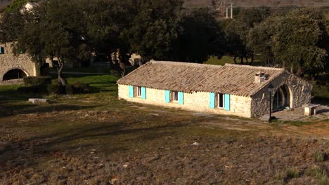 Old-Gothic-countryside-cottage-appears-nestled-amidst-a-sprawling-landscape