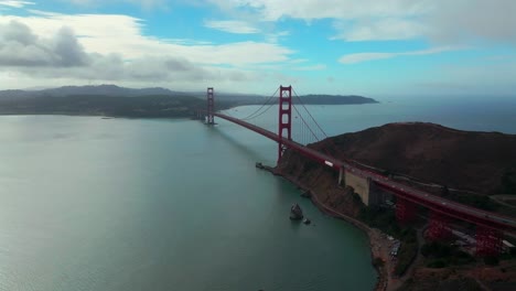 san francisco golden gate bridge aerial drone california point cavallo needles rock horseshoe bay area dana bowers vista point cloudy mist misty fog blue skies sausalito cars traffic circle right