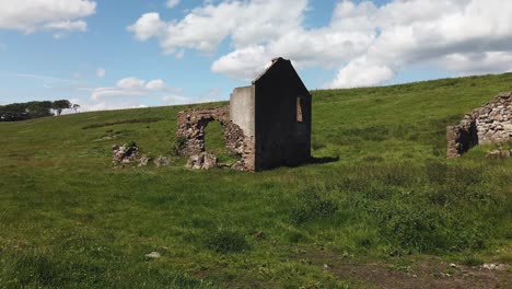 derelict farm in a coastal field in fife scotland