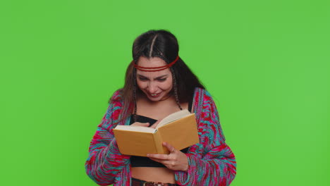 young hippie woman girl reading funny interesting fairytale story book laughing leisure hobby